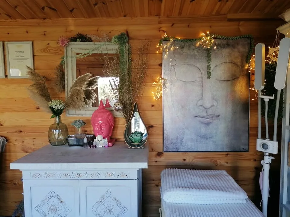 Szilvia’s garden studio with pampas grass, fairy lights and a treatment couch
